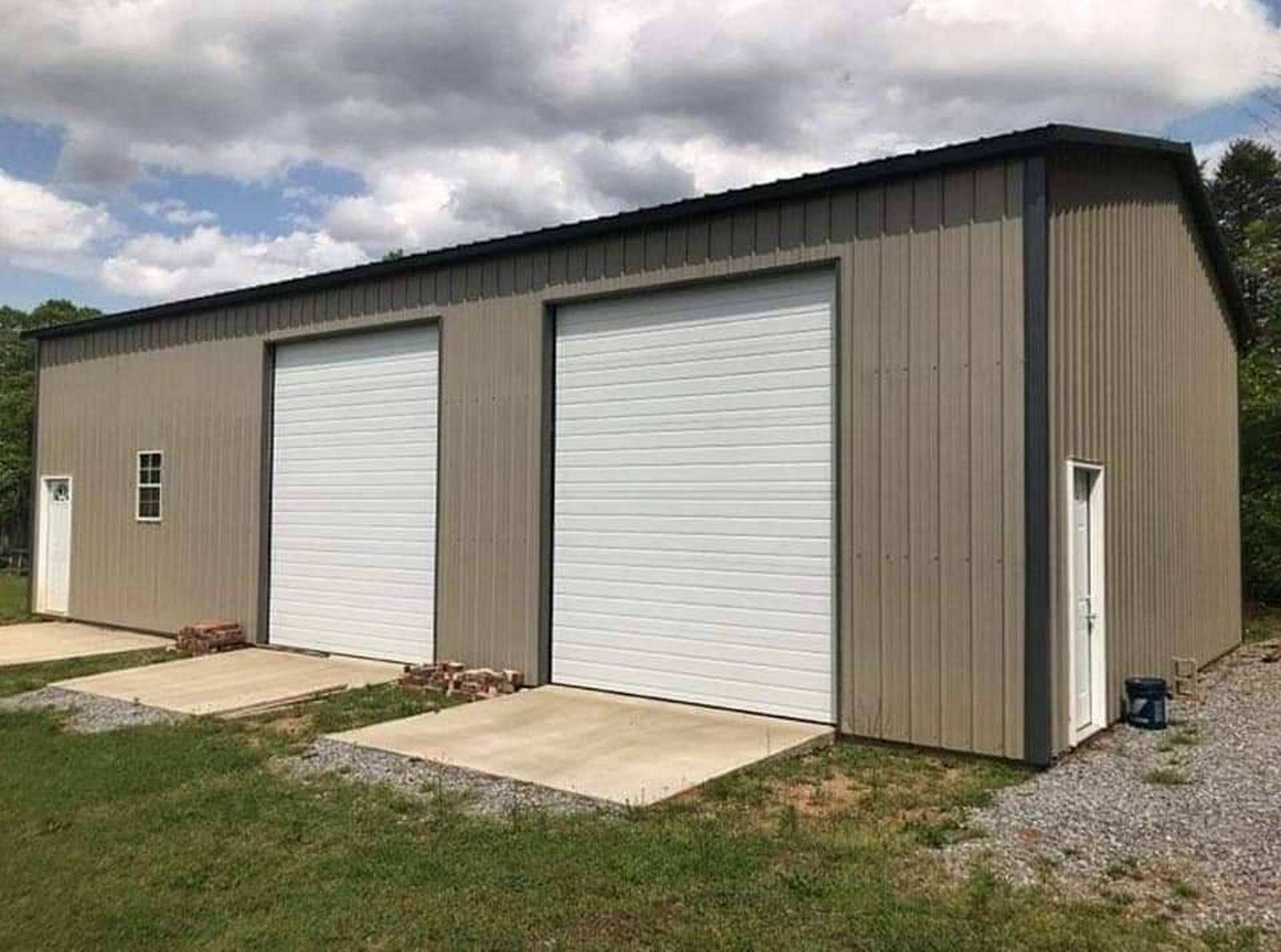 Vertical Siding Garage with Chain Hoist Doors Custom Structures Direct